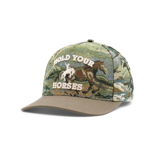 Camouflage cap with 'Hold Your Horses' text and horse graphic on a white background