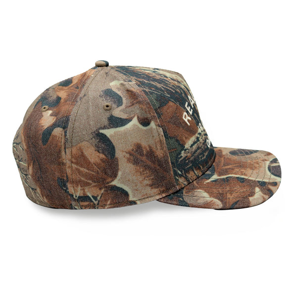 Realtree structured A-frame cap in faded Advantage camo with embroidered 1986 Columbus, GA front logo.