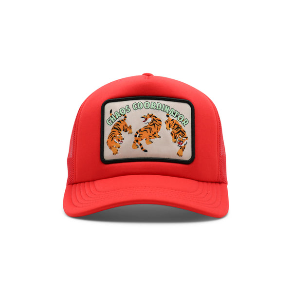 Red cap with a patch featuring two tigers and the text 'Chaos Coordinator' on a white background.