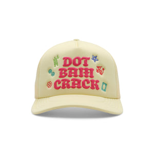Yellow cap with colorful text and designs on a white background
