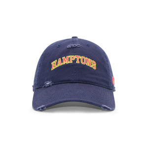 Navy blue cap with 'HAMPTONS' text on a white background