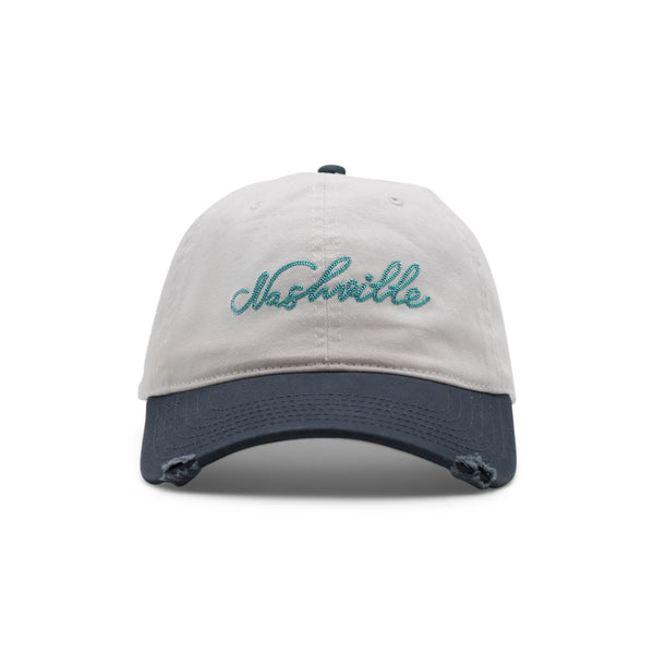 Cap with 'Nashville' embroidery on a white background